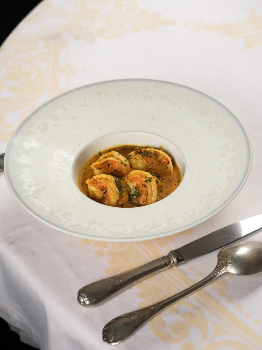 Prawn curry in an engraved plate