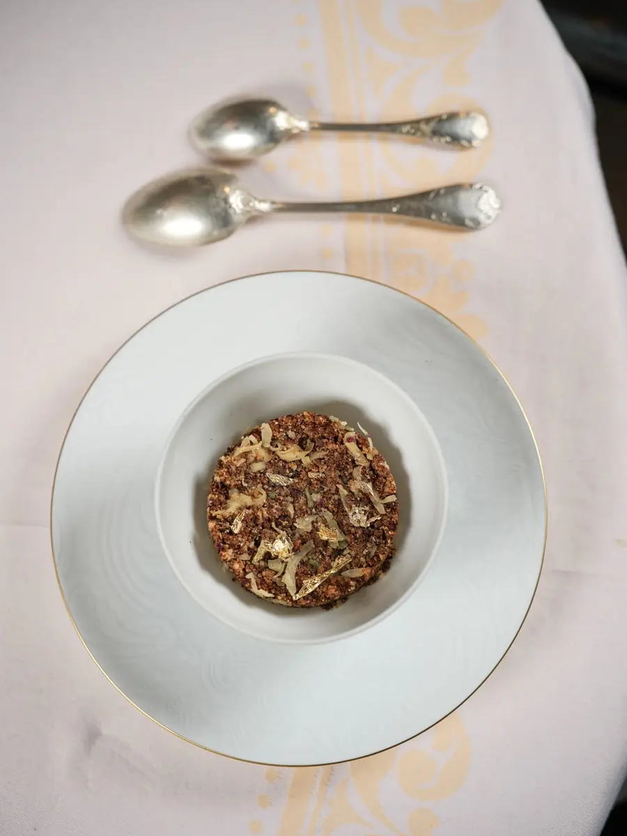 Spiced rice with dried fruits in a white plate